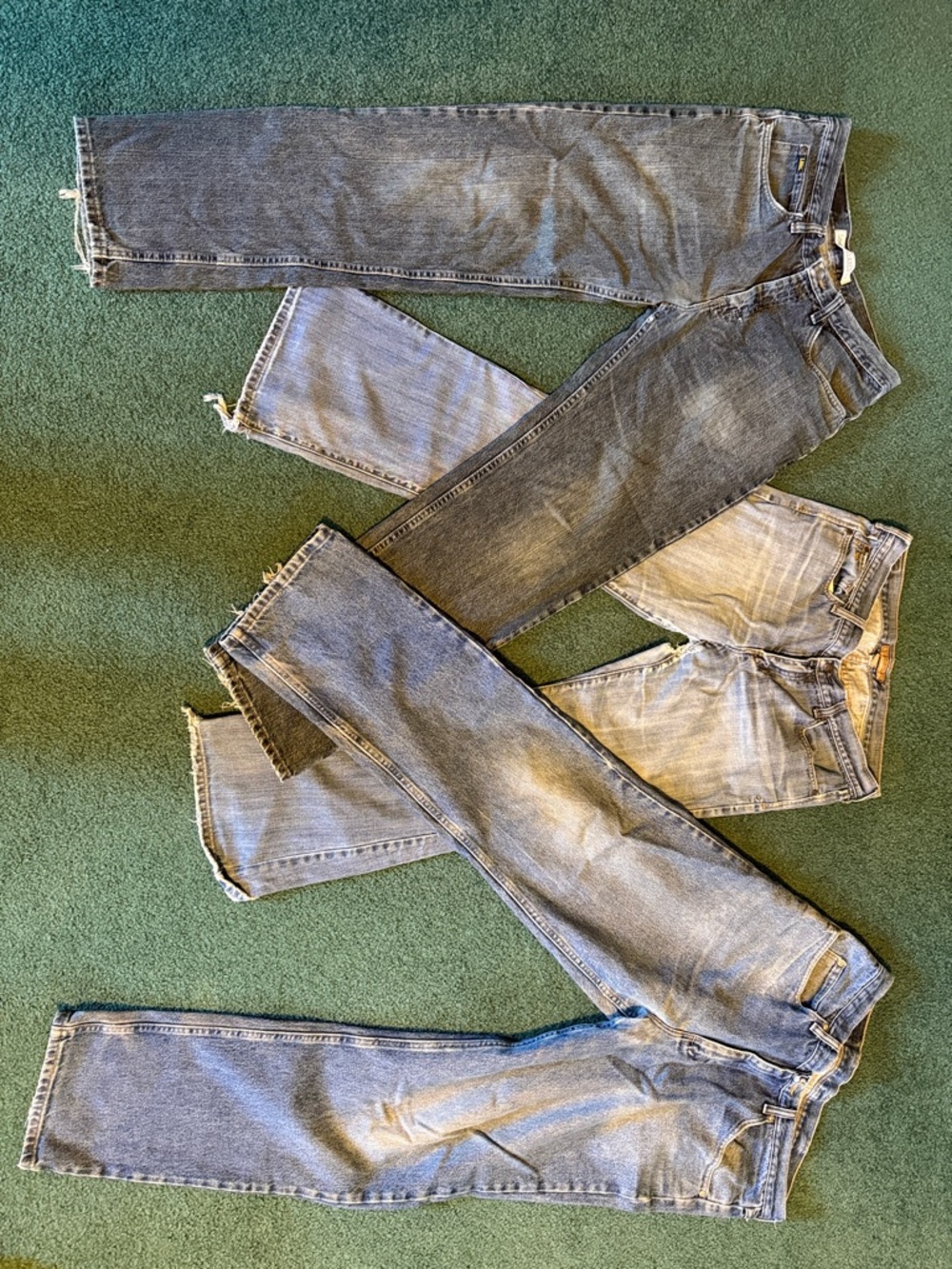 Upcycler bundle of 3 jeans, 34/32 Lee & Wrangler, A&F 10, worn in seat & hem